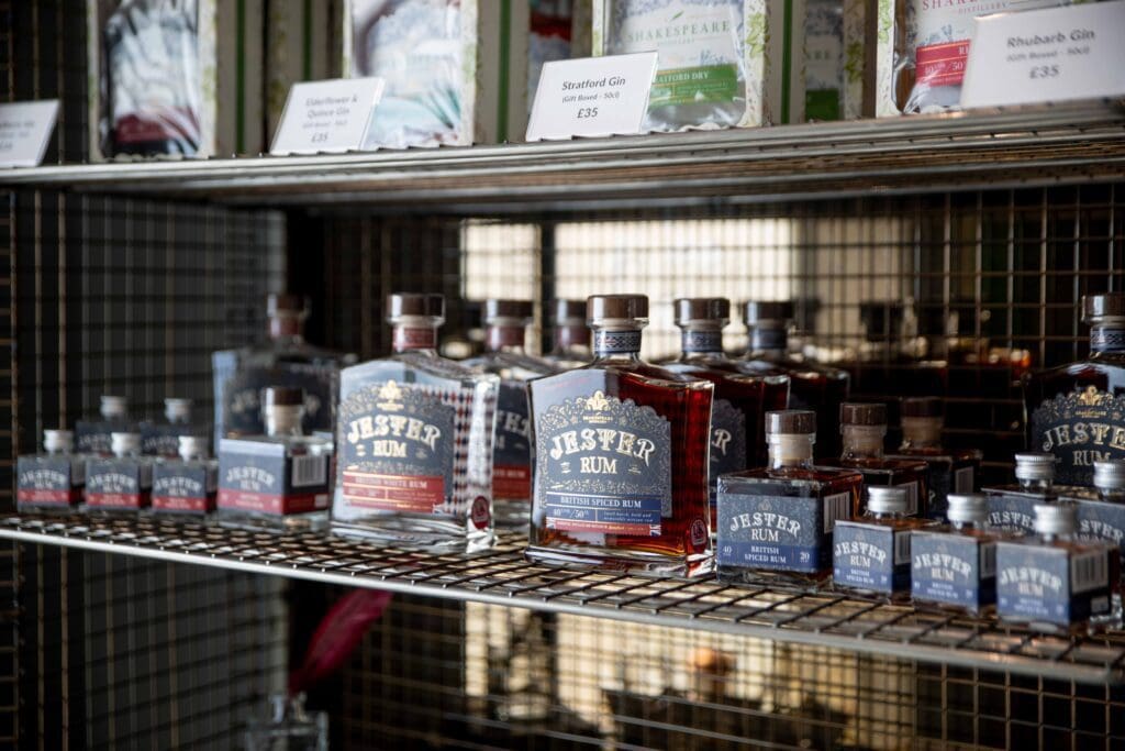 Shakespeare Distillery Jester Rum British Spiced or White Rum assorted bottles on shelf