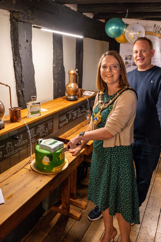 Major of Stratford cutting our celebration cake