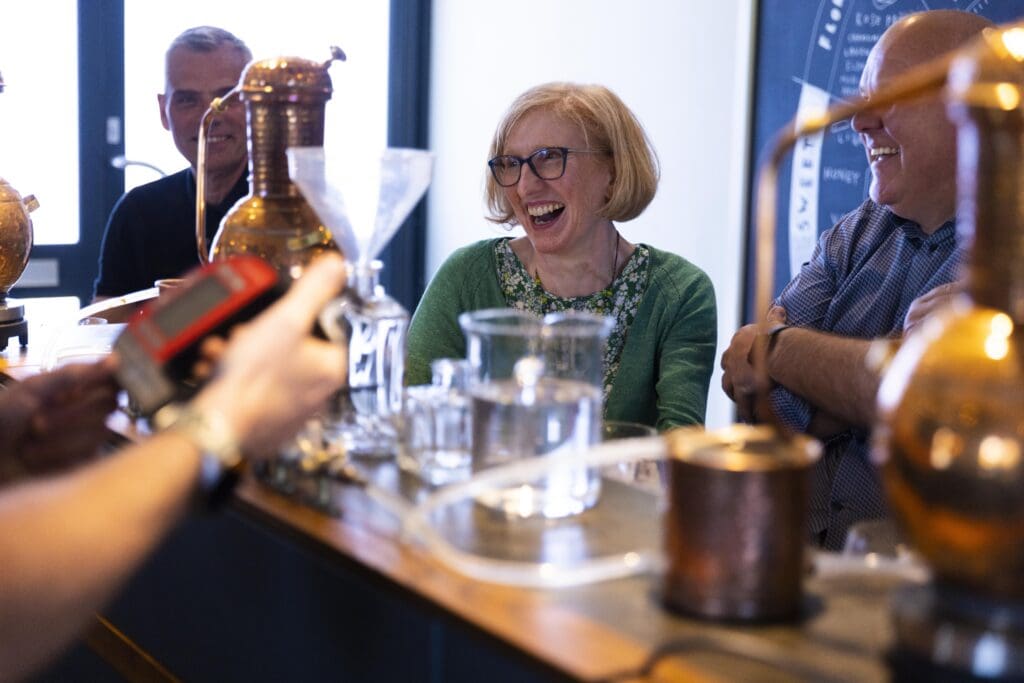 A lady enjoying a Gin School