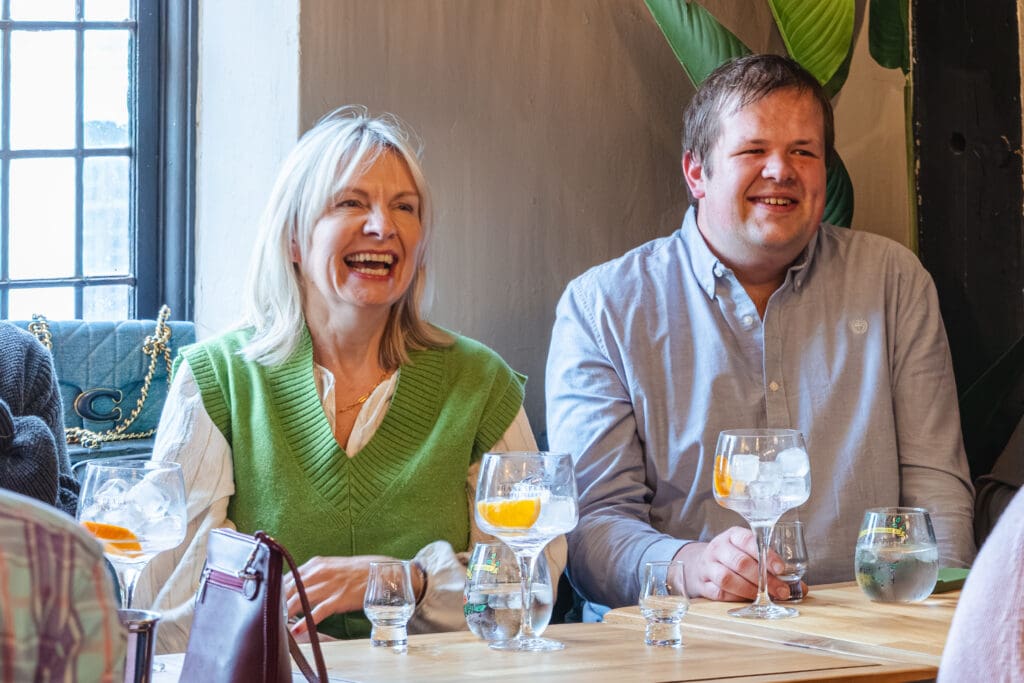 Two people enjoying a Gin Tasting at Judith's